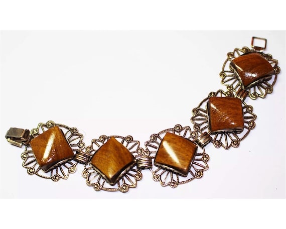 Ornate Goldtone clasp bracelet with polished natural wood inlays different unusual 70's mid century