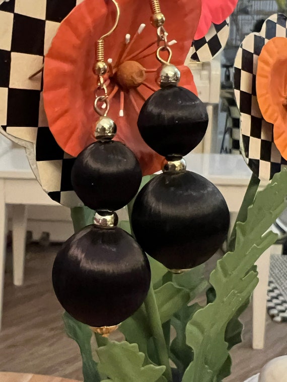 elegant black silk dangles, mid century Asian jewelry; Imported black silk beaded earrings With goldtone Spaces very pretty Sexy