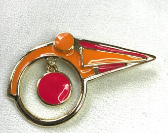 Pin abstracto moderno rosa y naranja esmaltado, estilo vintage de los 80, tono dorado, pop, MTV, generacional.