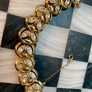 Glanzend goudkleurige en ijsstrass armband, sprankelende gesigneerde Coro Mid Century Hollywood Regency Glamour-sieraden