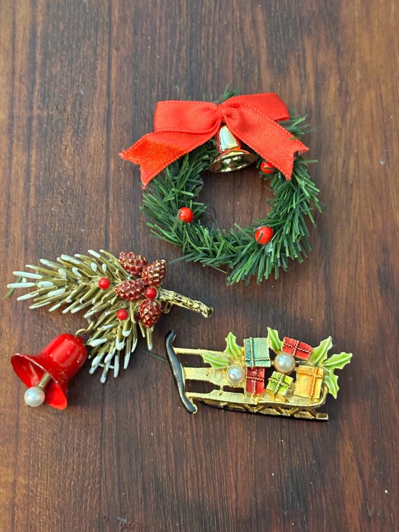 Festive Trio vintage holiday brooches- wreath sleigh & red bell, mid century Christmas pins, one signed ART