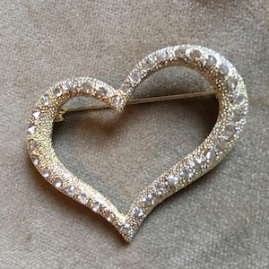 Sparkling Rhinestone encrusted Silvertone Heart Pendant