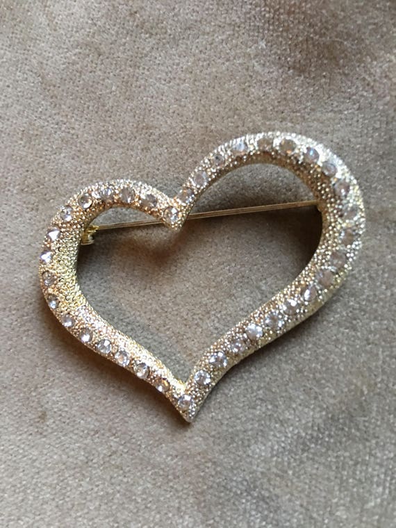 Sparkling Rhinestone encrusted Silvertone Heart Pendant