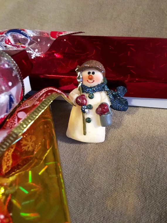 Vintage resin sparkly Christmas snowman holding a snow bucket  comes giftboxed & ribboned