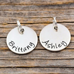 Silver name charm , hand stamped with a name or date. Personalized name charm. Customized charm