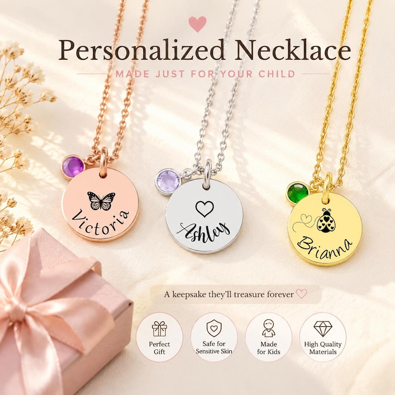 May include: Three personalized necklaces with round pendants. One is rose gold with a butterfly and the name "Victoria", another is silver with a heart and the name "Ashley", and the third is gold with a ladybug and the name "Brianna". Each necklace has a gemstone.