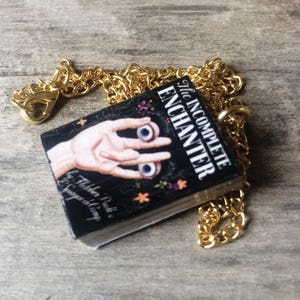 The Incomplete Enchanter's book necklace