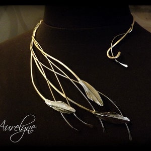 Torc necklace asymmetrical stainless Conte "The Beautiful Golden-Haired" bamboo leaves or feather and plant dreamy elf fairy tracery