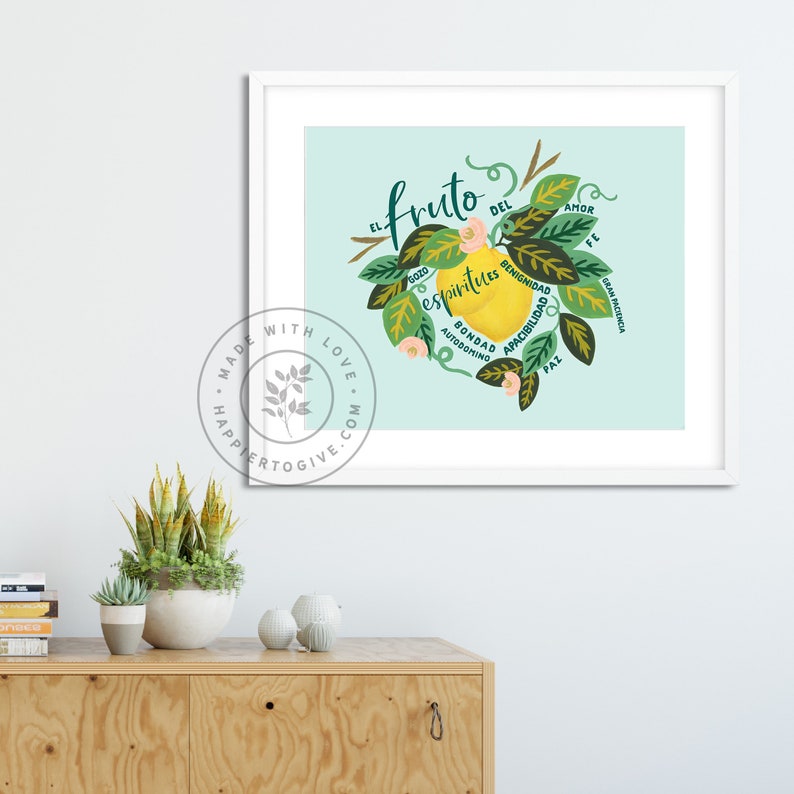 May include: A light blue background with a yellow lemon illustration. The lemon is surrounded by green leaves and flowers. The text "El fruto del espiritu" is written in a circle around the lemon. The words "Gozo, Bondad, Autodominio, Benignidad, Apacibilidad, Fe, Amor, Paz" are written around the lemon.