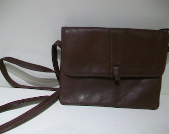 1980s leather pouch shoulder bag; small but roomy; unisex; great for travelling;  excellent condition