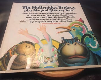 Vintage The Hollyridge Strings vinyl Record. Play: Magical mystery tour.