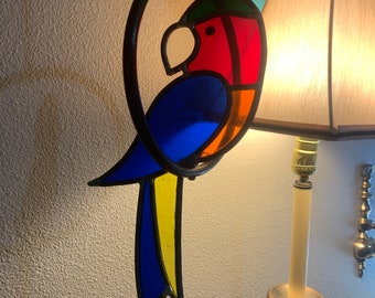 Large Vintage stained glass parrot on perch suncatcher.  Stained glass art. Tropical birds