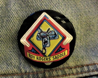 Vintage Roy Rogers' Saddle Badge on Plastic Buckles Pin