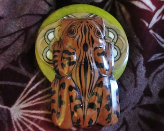 Frog Clicker on Bakelite Button Brooch