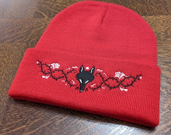 Wolf and Thorns beanie - red knitted beanie hat with embroidered wolf and thorns design