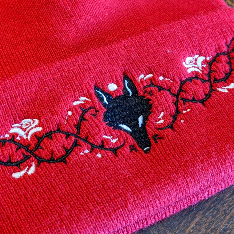 Wolf and Thorns beanie red knitted beanie hat with embroidered wolf and thorns design image 4