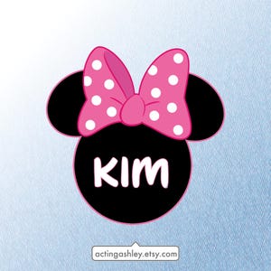 May include: Black and white Minnie Mouse head with a pink bow with white polka dots. The name "KIM" is written in white letters on the head.