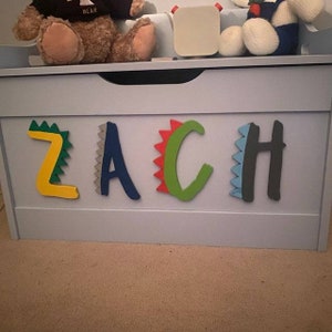 Dino Name and foot print shaped embellishments, toy box, toy box decorations, wooden stars, wooden name, 6mm