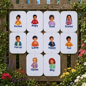 May include: A set of ten white rectangular signs featuring illustrations of children expressing various emotions. Each sign displays a child with a specific facial expression and gesture, labelled with the words Excited, Angry, Sad, Scared, Fed up, Love, Happy, Feel, Upset, and Shy.