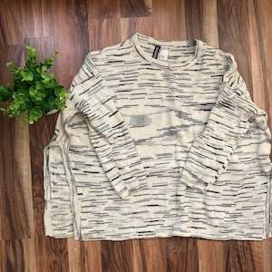 Creme und schwarz Funky Line Pullover w / Seite Split