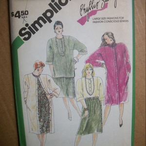 May include: A vintage Simplicity sewing pattern envelope featuring illustrations of women's clothing designs. The envelope is white with green and pink accents, and includes the text "Simplicity" and "Phyllis Sidney". The price is $4.50.