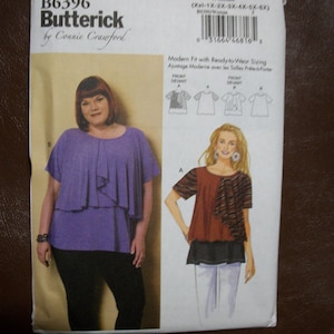 May include: A sewing pattern for a women's top with a ruffled neckline. The pattern is from Butterick and is designed by Connie Crawford. The pattern number is B6396. The pattern includes instructions for making two different styles of tops.
