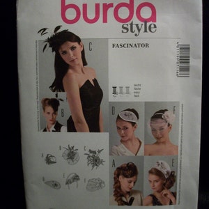 May include: A Burda Style 7116 sewing pattern envelope for a fascinator. The white paper packaging features the brand logo, the number 7116, and photographs of various headpieces labeled A through F, along with line drawings of each design.
