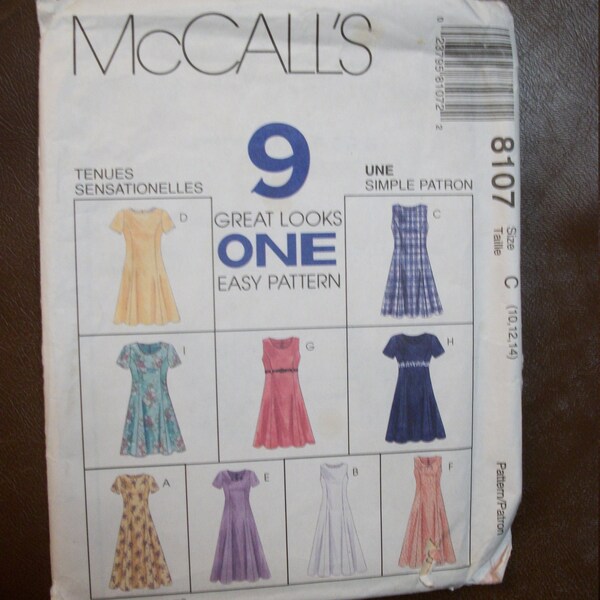 McCall 8107 Misses size C 10-12-14 pullover, short sleeved, sleeveless dresses.  9 great looks one easy pattern. Factory folded, uncut