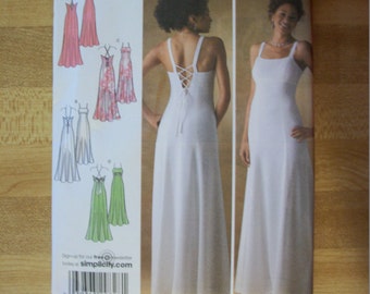 Simplicity 4143 Misses (Size P5 12,14,16,18,20) evening gown with back variations. Factory folded, uncut.