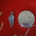 Oxidized Angel Wing Charm