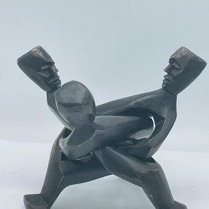 Hand Carved Wooden Interlocking Tribal Men Statue Tripod stand