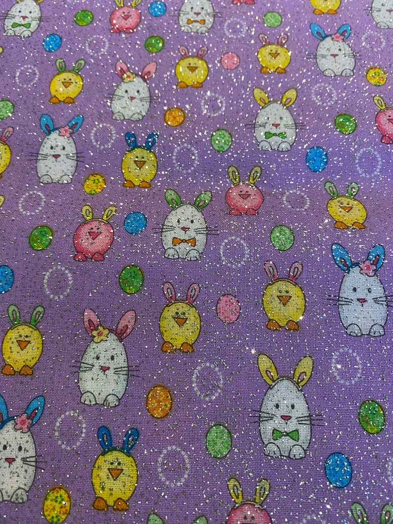 May include: Purple fabric with a repeating pattern of white bunnies with green bows, yellow chicks, and colorful polka dots.