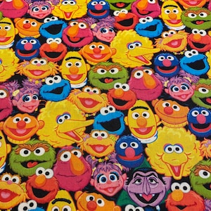 Sesame Street fat quarters stacked heads
