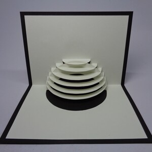 Carte pop-up architecture origamique demi-cercle