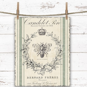 Puede incluir: Una impresión de estilo vintage con una ilustración en blanco y negro de una abeja y una corona. El texto dice "Candelot Pere Maison Fondée en 1854 Les Abeilles Bernard Frères Successeurs 148, Faubourg St Denis, 148".