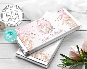May include: Two rectangular chocolate bar wrappers featuring a white background with pink and peach floral illustrations, a central swan graphic, and the text Sophia's 1st Birthday in script. Includes circular badges for instant download.
