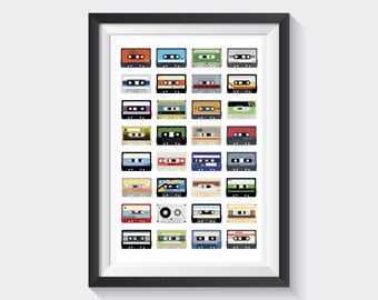 May include: A framed print featuring a grid of colorful cassette tapes. The tapes are in various colors, including orange, blue, green, and red, with labels and details. The artwork is set against a white background, framed in black.