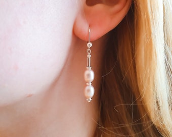 Delicate pearl earrings with 925 sterling silver