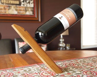 Wine barrel 'Balancing Act' wine bottle display and holder