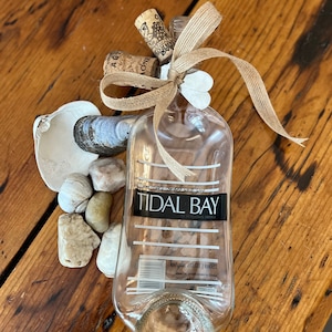 Återvunnet, nedsjunket vinflaskfat, Benjamin Bridge Tidal Bay, klart glas