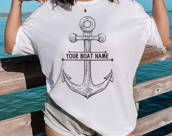 May include: White t-shirt with a black anchor graphic and the text "YOUR BOAT NAME" underneath.