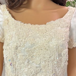 Suni is a vintage wedding dress/gown