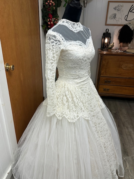 Deidre is a 1950s wedding dress