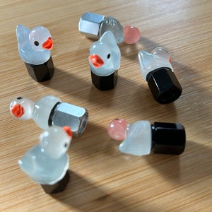 Tiny Glow Illuminating Duckies Tire valve cap set of 2, 4 or 5 YOU MUST ACTIVATE with light