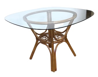 Vintage Rattan Dining Table • Sculptural Swept-Leg Base, Woven Shelf, Oval Glass Top