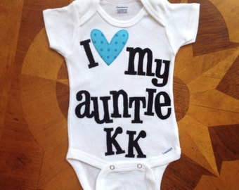 I heart my aunt onesie in turquoise and black with appliquéd letters and heart