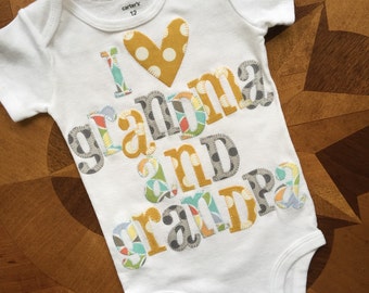 I heart grandma and grandpa appliqued onesie in gray, mustard yellow and multicolor pastels