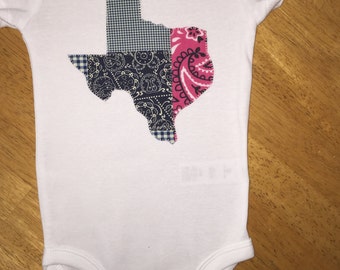 Texas onesie in blues and pinks