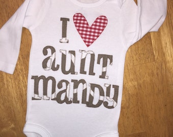 Custom appliquéd baby onesie