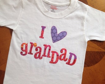 I heart my grandad white Tshirt that is appliquéd with beautiful fabrics in pinks and purples